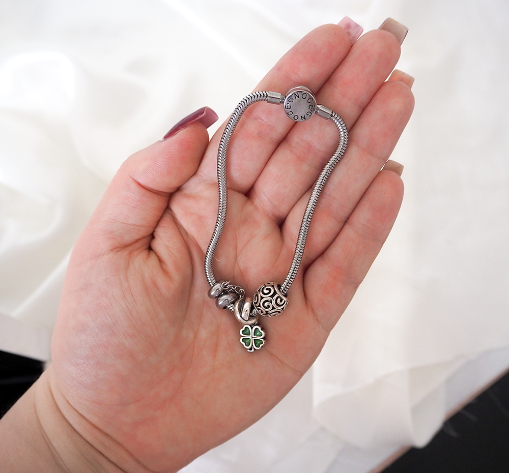 Pandora charms on Gnoce bracelet image